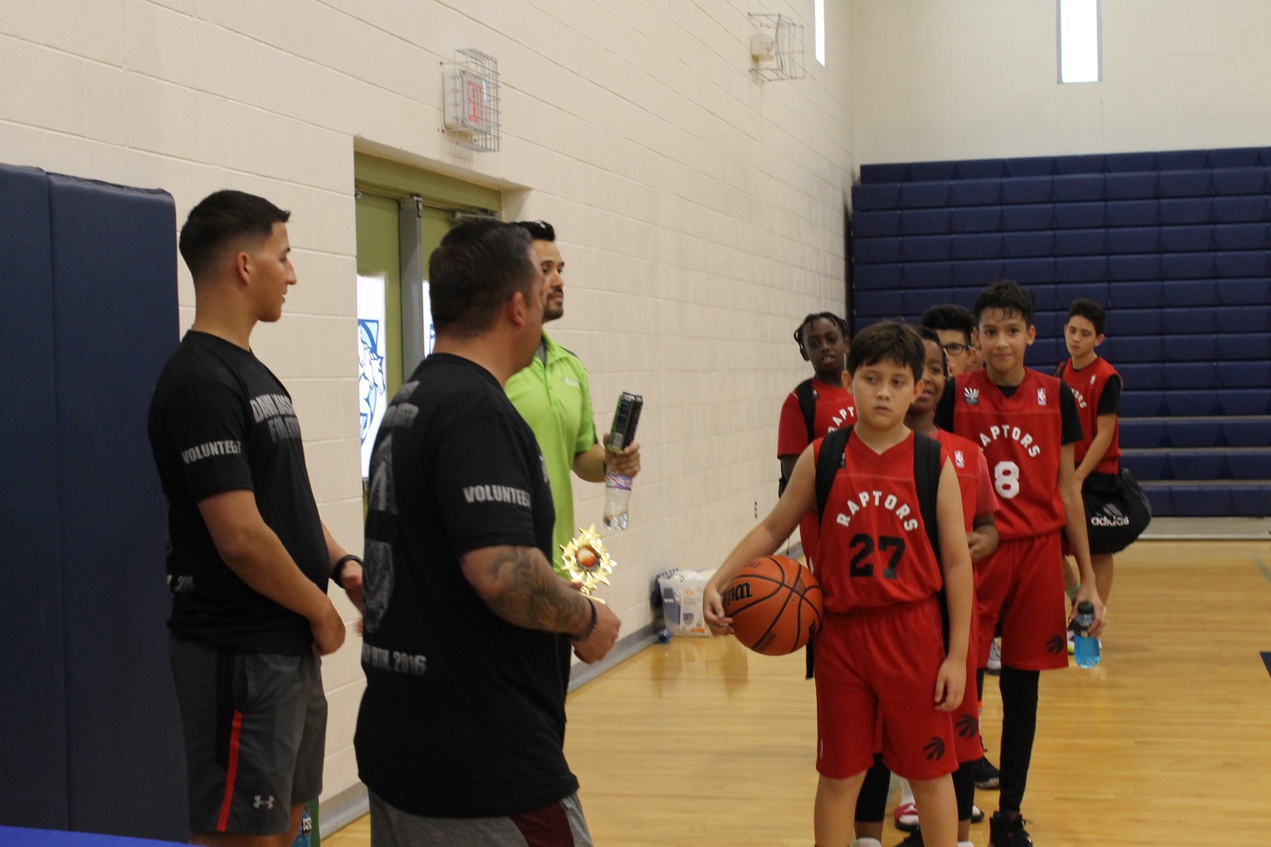 Coaches handing out trophies
